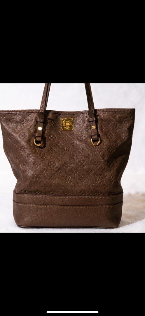 Louis Vuitton Citadine PM Empreinte Ombre (Category: Luxury Bags & Wallets) located in Cebu City. Submitted by 88kisses (Listing ID 1396527739, Image 1). Description: - Authentic Louis Vuitton Citadine PM handbag - Crafted from luxurious Empreinte leather - Classic LV monogram pattern - Includes a matching pouch - Comes with original receipt dated December 1, 2011 - Elegant top handle design - Features gold-tone hardware - Original price: 73,000 