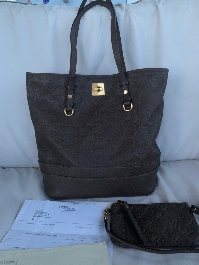 Louis Vuitton Citadine PM Empreinte Ombre (Category: Luxury Bags & Wallets) located in Cebu City. Submitted by 88kisses (Listing ID 1396527739, Image 3). Description: - Authentic Louis Vuitton Citadine PM handbag - Crafted from luxurious Empreinte leather - Classic LV monogram pattern - Includes a matching pouch - Comes with original receipt dated December 1, 2011 - Elegant top handle design - Features gold-tone hardware - Original price: 73,000 