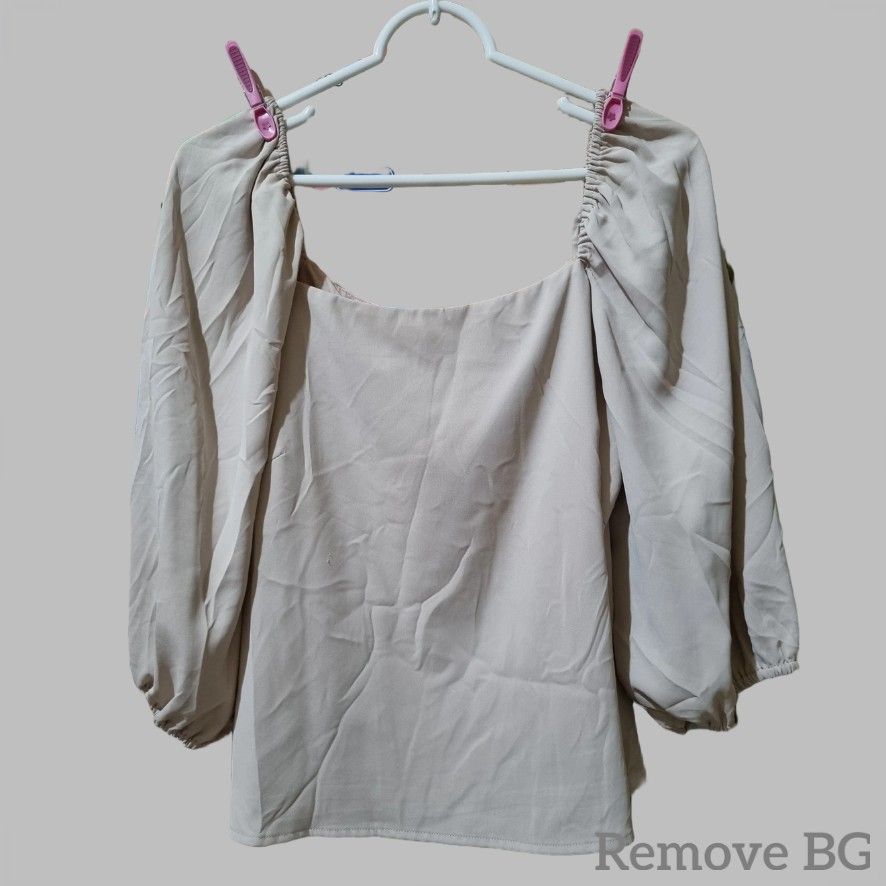 Love, Bonito Square Neck Blouse (Category: Blouses) located in Quezon City. Submitted by stylemd (Listing ID 1396480234, Image 1). Description: - Love, Bonito beige blouse - Square neckline - 3/4 sleeves - Size: LB XL / UK 14 / US 10 - Material: 100% polyester - Features: Slight gathering at shoulders and sleeves - Note: Small mark on fabric (loose thread, not noticeable).