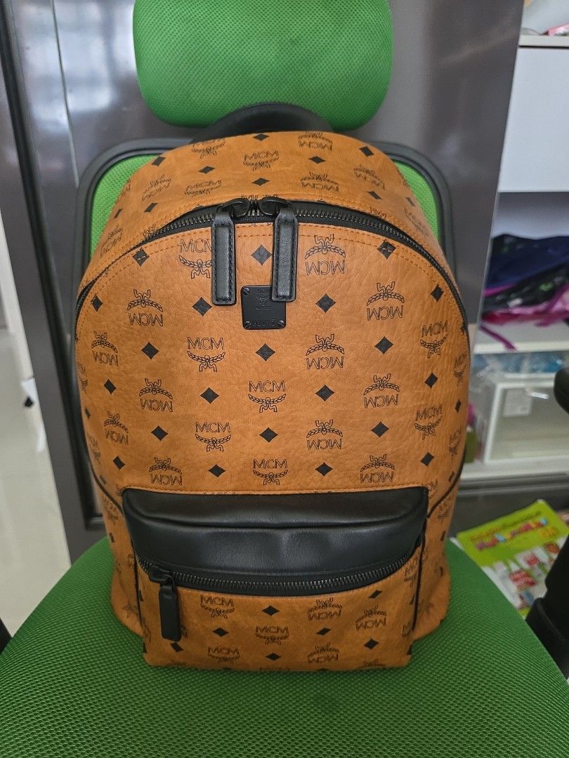 Medium backpack (Category: Bags & Wallets) located in Singapore. Submitted by juzme83 (Listing ID 1396502326, Image 2). Description: Authentic with dustbag, invoice and cards from KL Pavilion boutique less than 2 years ago. Carried less than 10 times..