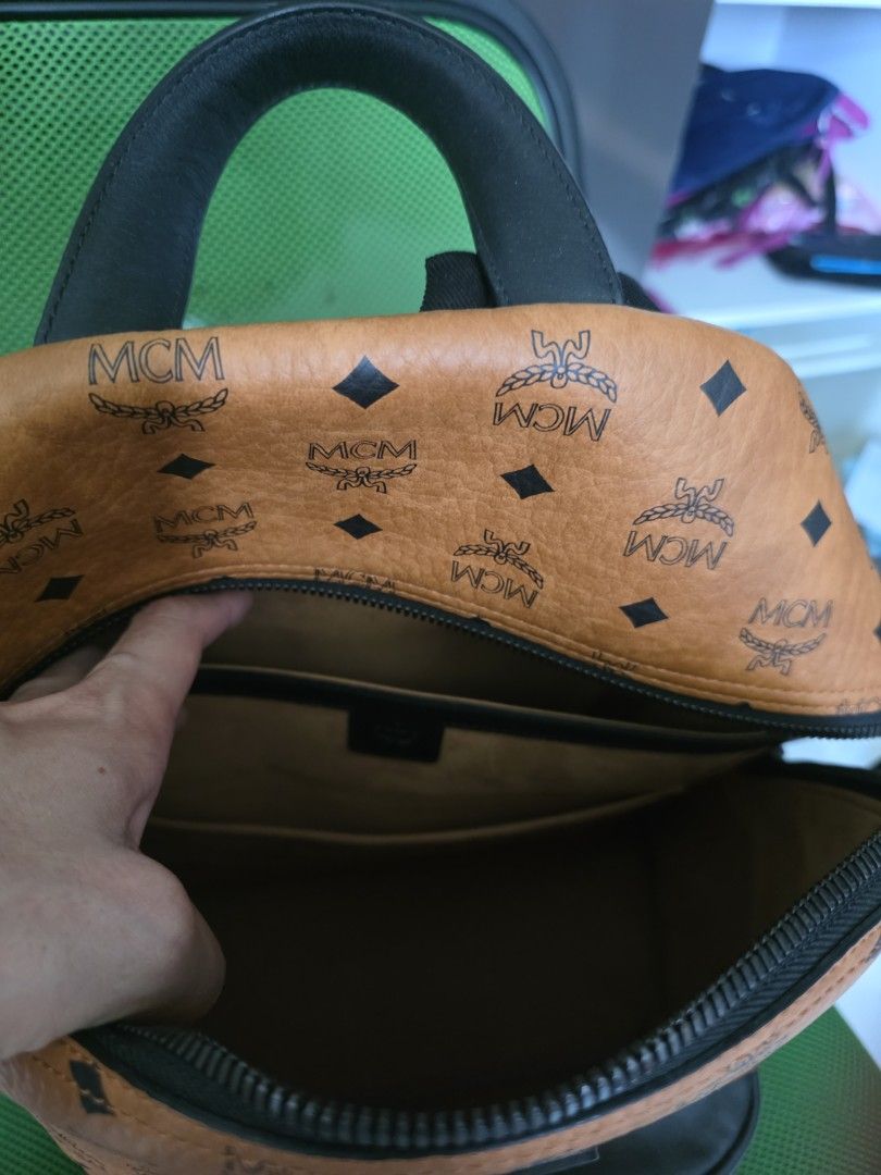 Medium backpack (Category: Bags & Wallets) located in Singapore. Submitted by juzme83 (Listing ID 1396502326, Image 3). Description: Authentic with dustbag, invoice and cards from KL Pavilion boutique less than 2 years ago. Carried less than 10 times..