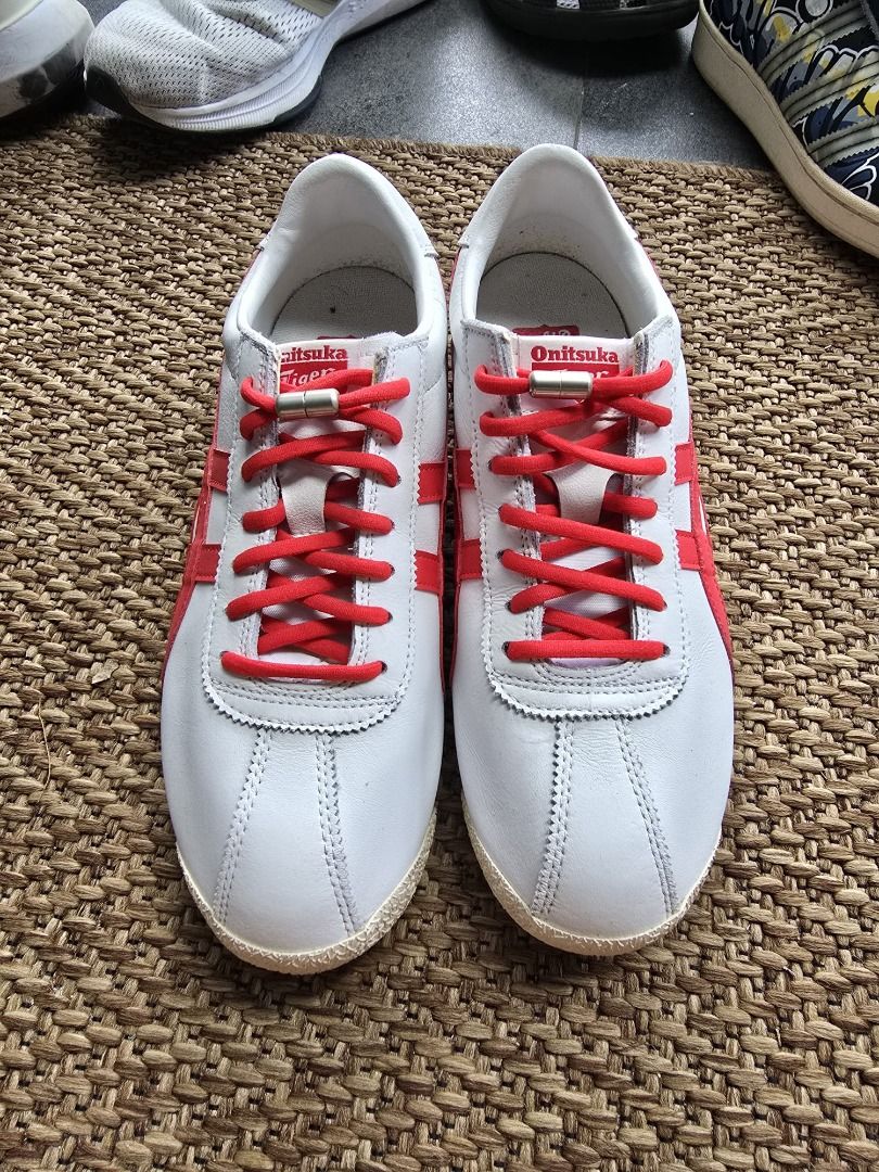 Onitsuka Tiger Mexico 66 Sneakers - White/Red (Category: Sneakers) located in Singapore. Submitted by abird (Listing ID 1396539366, Image 3). Description: - Onitsuka Tiger Corsia sneakers, used once - White with red stripes - Red laces - Blue stripe on sole - Minor signs of wear, no box - Ideal for casual wear - Sell to make space. Please check the actual size in pic. US 6.5/UK 7.5.