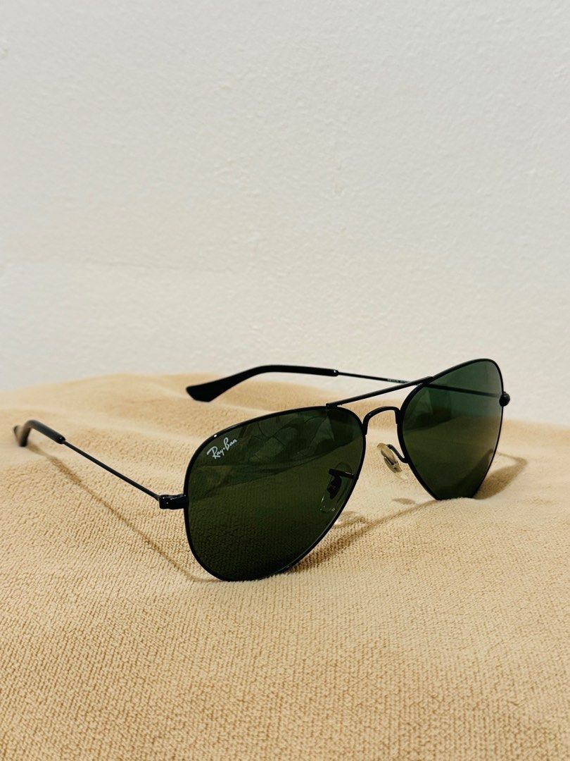 Ray-Ban Aviator Large Metal Sunglasses (Category: Sunglasses & Eyewear) located in Manila. Submitted by ewikamiy (Listing ID 1396562688, Image 2). Description: - Authentic Ray-Ban Aviator Large Metal sunglasses - Classic aviator design - Green lenses - Black metal frame - Model: RB3025 - Lens size: 58mm - Made in Italy - Unisex design - Features Ray-Ban logo.