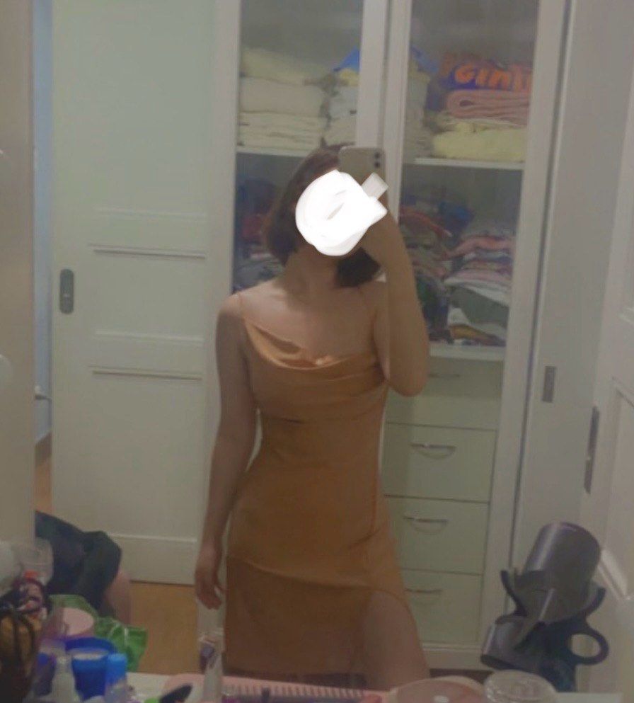 Satin Mini Dress with Slit (Category: Dresses) located in Rodriguez. Submitted by alekshivers (Listing ID 1396539812, Image 3). Description: - Satin mini dress - Cowl neckline - Spaghetti straps - Thigh-high slit - Flattering silhouette - Low back design - Neutral color - Perfect for special occasions.