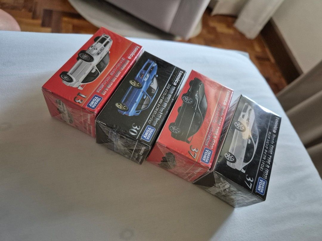 Tomica Diecast Car Set (can be bought individually) (Category: Vehicle & Diecast Models) located in Paranaque City. Submitted by nik_dc (Listing ID 1396524477, Image 2). Description: Four Tomica diecast cars included -- - Honda Civic Type R (FD2) (white and black) - 400 each - Subaru Impreza WRX STI (blue) - 500 - Mitsubishi Lancer Evolution VI GSR (white) - 650 payment via gcash shipping c/o buyer.