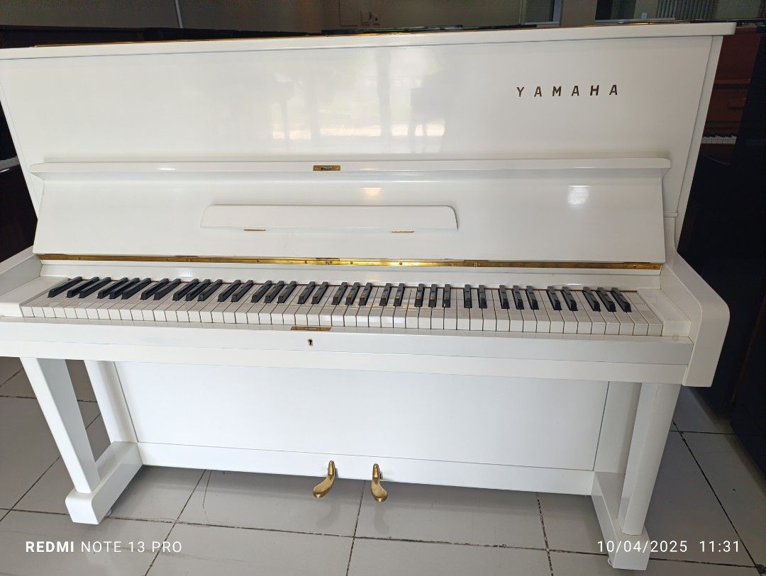 Upright piano (Category: Musical Instruments) located in Manila. Submitted by swiftstar.3eae19 (Listing ID 1396483018, Image 1). Description: Yamaha U1 D with 2 pedals. Japan made piano in very good condition. Free bench, delivery and caster caps. Given 5 years warranty for parts & services..