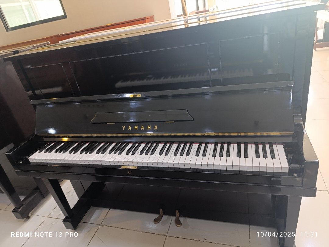 Upright piano (Category: Musical Instruments) located in Manila. Submitted by swiftstar.3eae19 (Listing ID 1396483018, Image 3). Description: Yamaha U1 D with 2 pedals. Japan made piano in very good condition. Free bench, delivery and caster caps. Given 5 years warranty for parts & services..