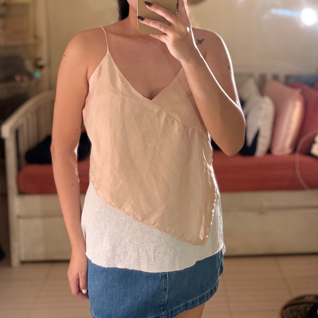Zara Collection Layered Cami Top (Category: Sleeveless) located in Valenzuela. Submitted by mango____ (Listing ID 1396579620, Image 2). Description: - Zara Cami Top - Layered design - Beige color with white underlay - V-neckline - Spaghetti straps.