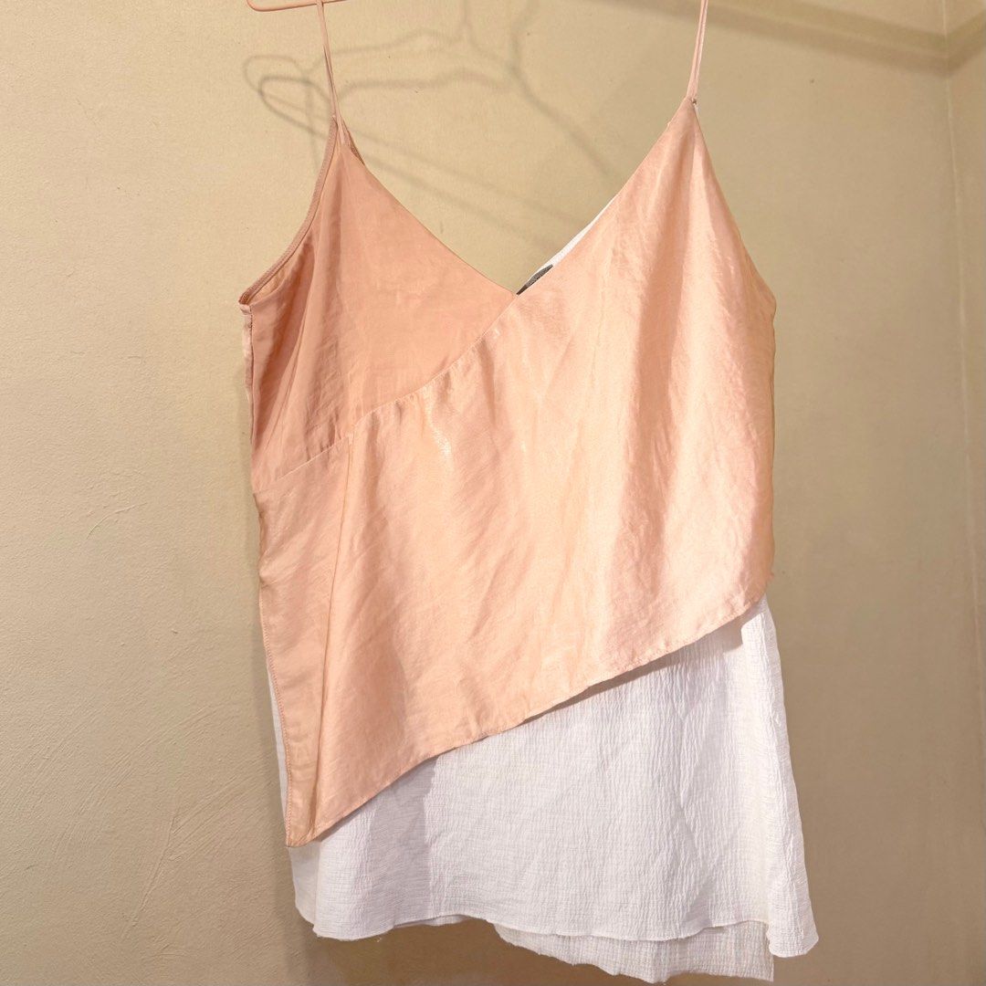 Zara Collection Layered Cami Top (Category: Sleeveless) located in Valenzuela. Submitted by mango____ (Listing ID 1396579620, Image 3). Description: - Zara Cami Top - Layered design - Beige color with white underlay - V-neckline - Spaghetti straps.