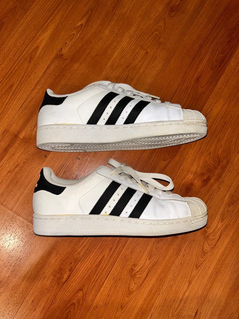 Adidas Superstar Sneakers (US 7.5) (Category: Sneakers) located in Quezon City. Submitted by _secondhandshop (Listing ID 1396797087, Image 1). Description: - Adidas Superstar sneakers - Used only a few times - Size: US 7.5 - RFS: Decluttering.