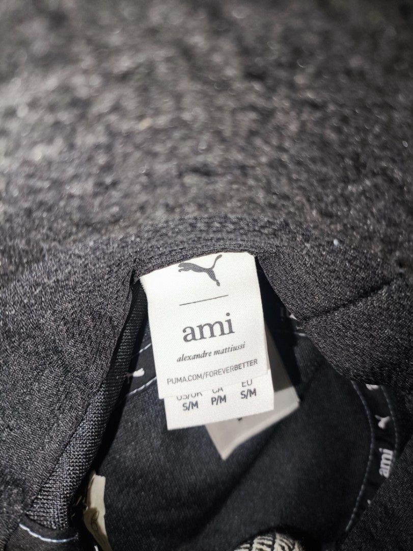 AMI X PUMA BUCKET HAT (Category: Caps & Hats) located in Manila. Submitted by rewearables.mnl (Listing ID 1396768273, Image 3). Description: FOR SALE -AMI X PUMA BUCKET HAT CONDITION:11/10 COLOR RATE:11/10 ISSUE:NO ISSUE COLOR :BLUE ASKING PRICE:3500 **REWEARABLES PRODUCT DISCLAIMER** All items sold through this thrift store are **pre-owned, secondhand, or vintage** unless otherwise stated. As such, products may show signs of previous use, includ
