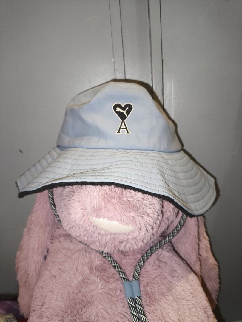 AMI X PUMA BUCKET HAT (Category: Caps & Hats) located in Manila. Submitted by rewearables.mnl (Listing ID 1396768273, Image 1). Description: FOR SALE -AMI X PUMA BUCKET HAT CONDITION:11/10 COLOR RATE:11/10 ISSUE:NO ISSUE COLOR :BLUE ASKING PRICE:3500 **REWEARABLES PRODUCT DISCLAIMER** All items sold through this thrift store are **pre-owned, secondhand, or vintage** unless otherwise stated. As such, products may show signs of previous use, includ