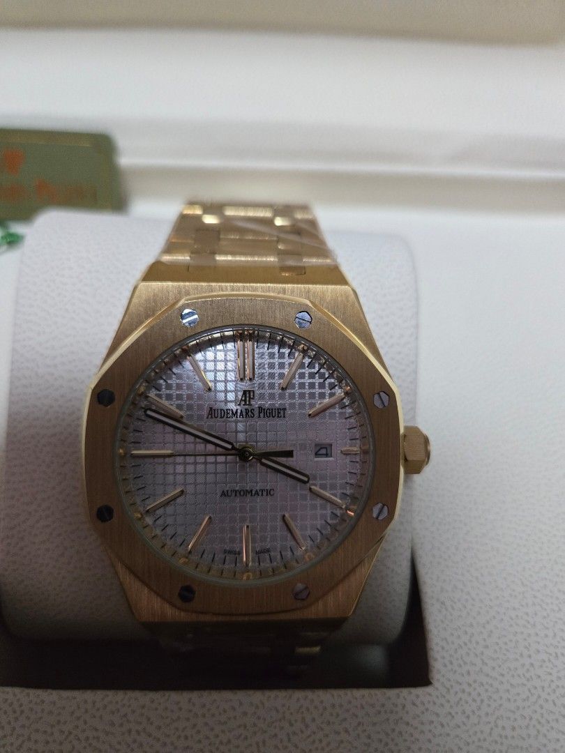 AP Royal Oak Gold with white dial (Category: Luxury Watches) located in Manila. Submitted by angeliosca53522 (Listing ID 1396674040, Image 3). Description: Brand-new Audemars Piguet Royal Oak Gold with white dial with box can ship anywhere in the Philippines.
