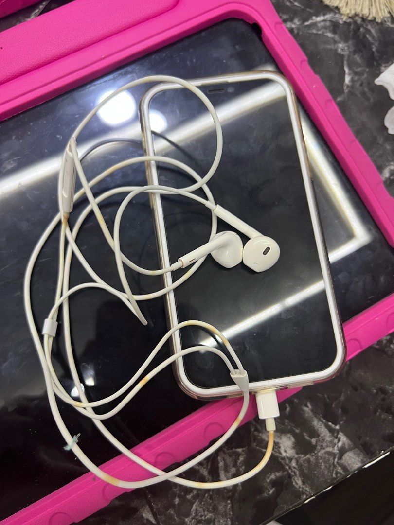 Apple EarPods with Lightning Connector (Category: Earphones) located in Caloocan City. Submitted by axljimenez94043 (Listing ID 1396713587, Image 1). Description: - Apple Earpods with Lightning Connector - Includes earphones and lightning connector - Features volume control buttons - Cable and connector show some discoloration - Earphones marked with 'R' and 'L' for right and left All are working!!! Pm me for details. .