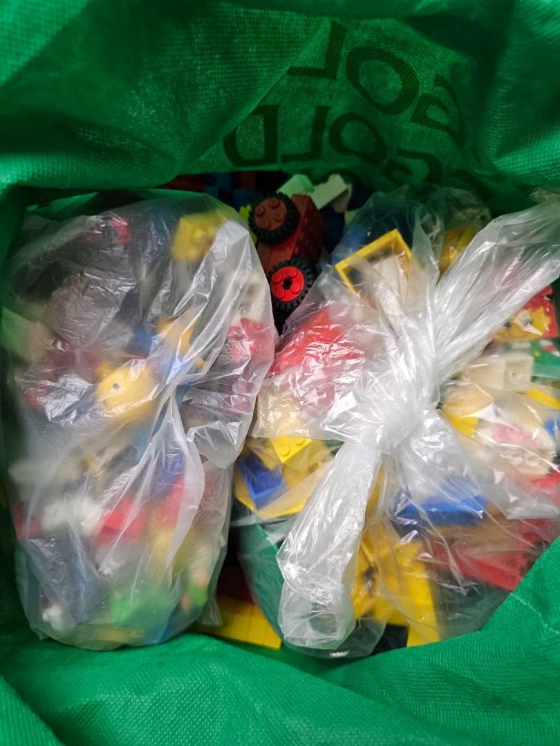 Assorted Lego Basic & Fabuland Bricks 4kg (Category: Lego & Building Sets) located in Caloocan City. Submitted by kuyapogi123 (Listing ID 1396830958, Image 3). Description: - Assorted Lego bricks - Various colors and sizes - Includes base plates, windows, and specialty pieces - Includes Lego basic figures - Stored in a green bag, cardboard box, - plastic bag is probably bootleg extra free - Great for building and creative play.