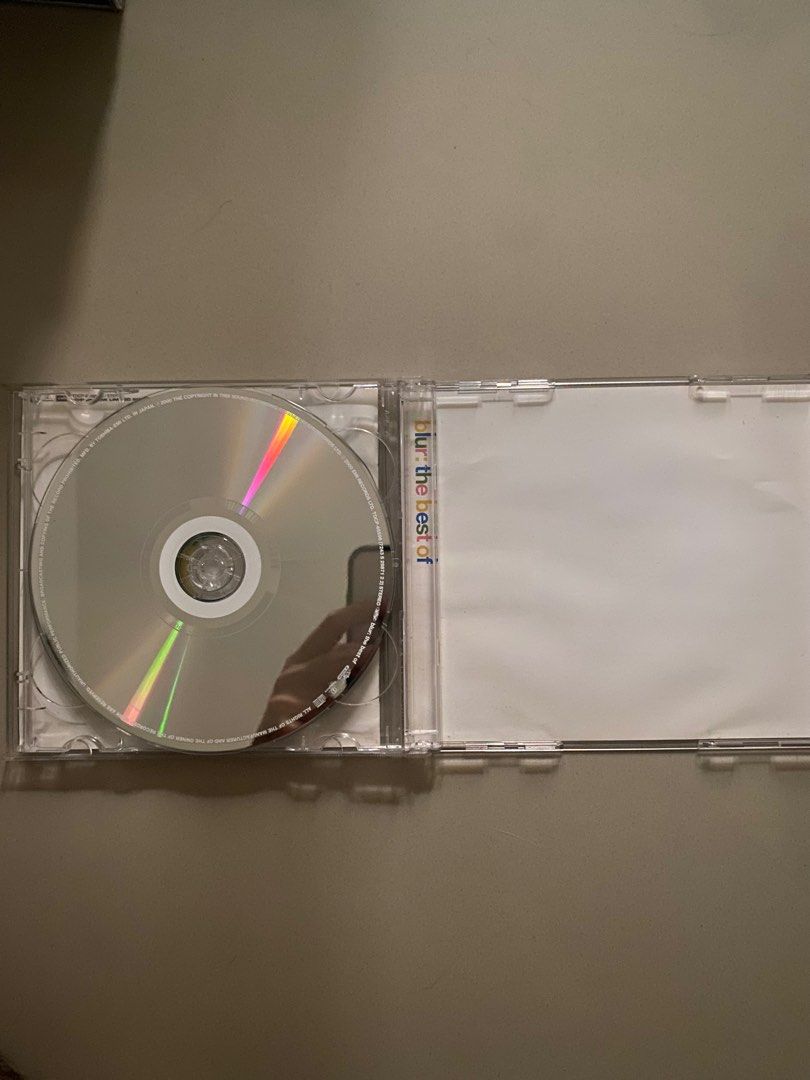 Blur - The Best Of (Category: CDs & DVDs) located in Mabalacat. Submitted by retromark (Listing ID 1396746984, Image 3). Description: - Blur "The Best Of" (Japanese Edition) 2CD - Features popular tracks: "Beetlebum", "Song 2", "Girls & Boys", and more. - Includes two discs. - Album cover with colorful band design. - Comes in original case and packaging..