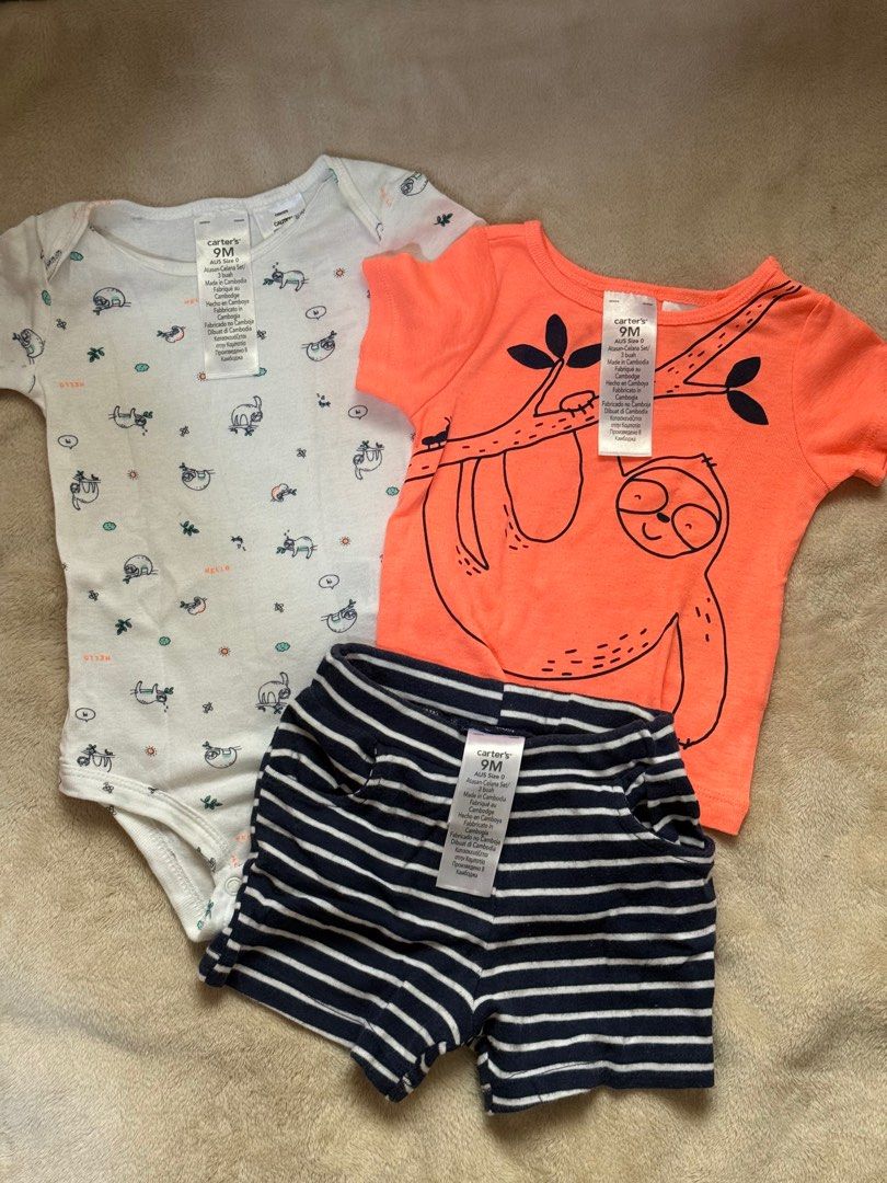 Carter's 3-Piece Baby Clothes Set - 9M (Category: Babies & Kids Fashion) located in Marikina City. Submitted by crzbrdn (Listing ID 1396721834, Image 3). Description: - Carter's 3-piece set - Size: 9M - Includes: - Coral t-shirt with sloth graphic - White onesie with sloth prints - Navy and white striped shorts - Perfect for your little one!.