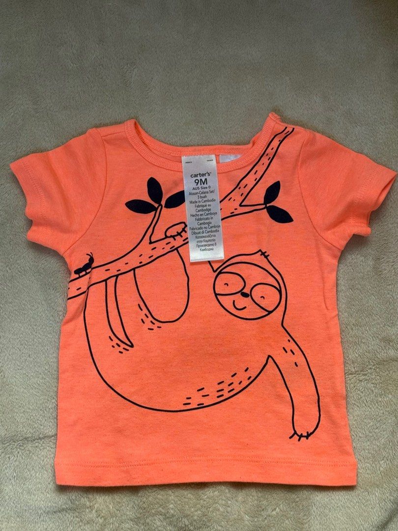 Carter's 3-Piece Baby Clothes Set - 9M (Category: Babies & Kids Fashion) located in Marikina City. Submitted by crzbrdn (Listing ID 1396721834, Image 1). Description: - Carter's 3-piece set - Size: 9M - Includes: - Coral t-shirt with sloth graphic - White onesie with sloth prints - Navy and white striped shorts - Perfect for your little one!.