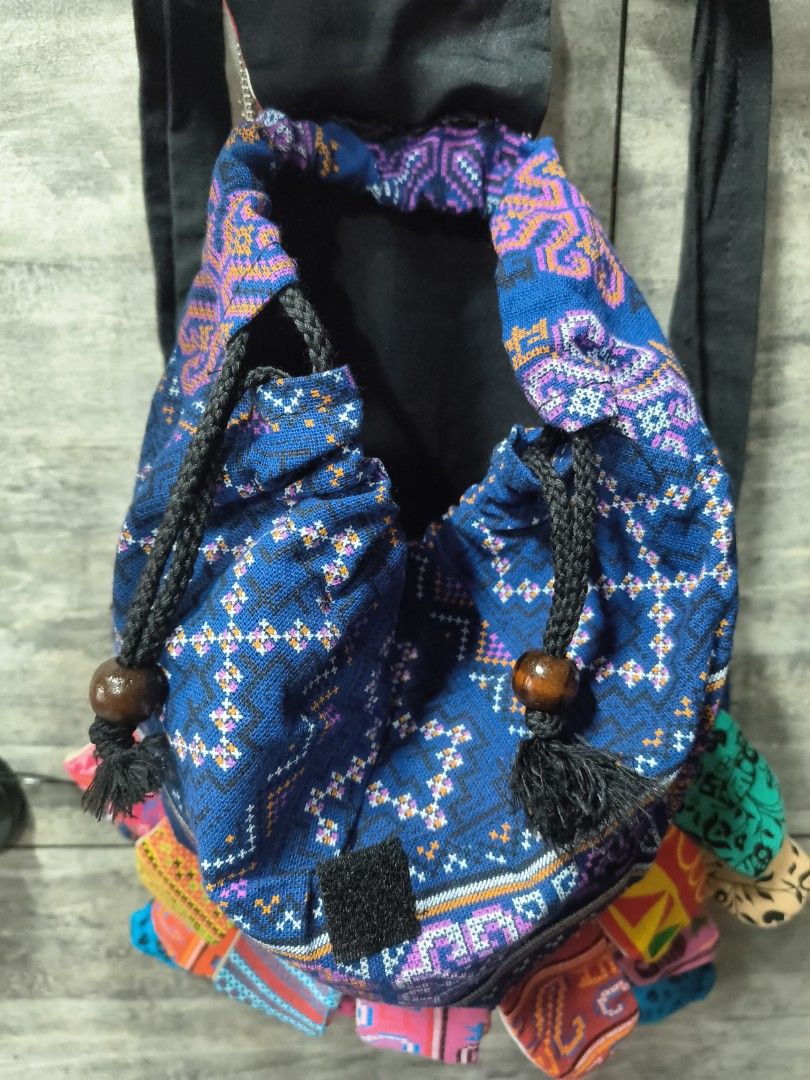 Elephant Drawstring Backpack (Category: Backpacks) located in Singapore. Submitted by notyourfriend (Listing ID 1396685230, Image 2). Description: - Unique elephant design drawstring backpack. - Features vibrant patterned fabrics. - Playful elephant face detail. - Drawstring closure for easy access. - Adjustable straps for comfort. - Perfect for carrying essentials with a whimsical touch..
