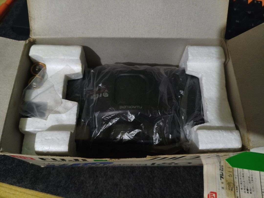 Fuji Cardia 180 Compact Camera with Tripod (Category: Cameras) located in Bauang. Submitted by jerwinpere15921 (Listing ID 1396668191, Image 3). Description: - Fuji Cardia 180 film camera included - Original box and documentation included - Features a Fujinon lens - Autofocus capabilities - Includes a Hakuba Compact 8 section tripod - Tripod comes with a carrying case 100 % working and tested no issue no damage 100% brand new.