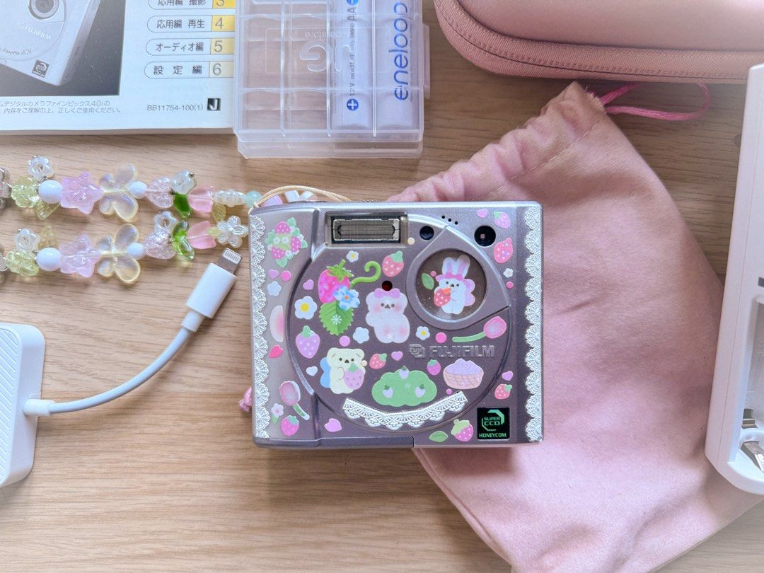 Fujifilm FinePix 40i (Category: Cameras) located in Manila. Submitted by userisaki (Listing ID 1396762545, Image 2). Description: 🌸🎀 Fujifilm FinePix 40i 🌸🎀 ☆ RARE unit; ready to use ☆ No functional issues (all buttons and flash working) ☆ Body condition - 10/10 ☆ Possible issue: Text is in Japanese (can be dealt with through translator apps/sites) ☆ Minimal issue: Has small ‘dead’ pixels on the screen but it doesn’t affect the outputs of the