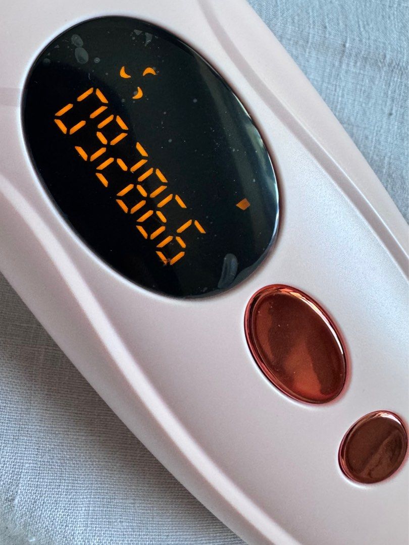 IPL Hair Removal Device (Category: Hair Removal) located in Makati City. Submitted by thecloset.edit.ph (Listing ID 1396757953, Image 2). Description: Achieve smooth, hair-free skin at home with this powerful IPL hair removal device! It has a digital display showing 92,866 flashes remaining, good for years of use and full-body sessions. • Stylish pink design with rose gold accents • Features two control buttons • Oval-shaped digital display • Com