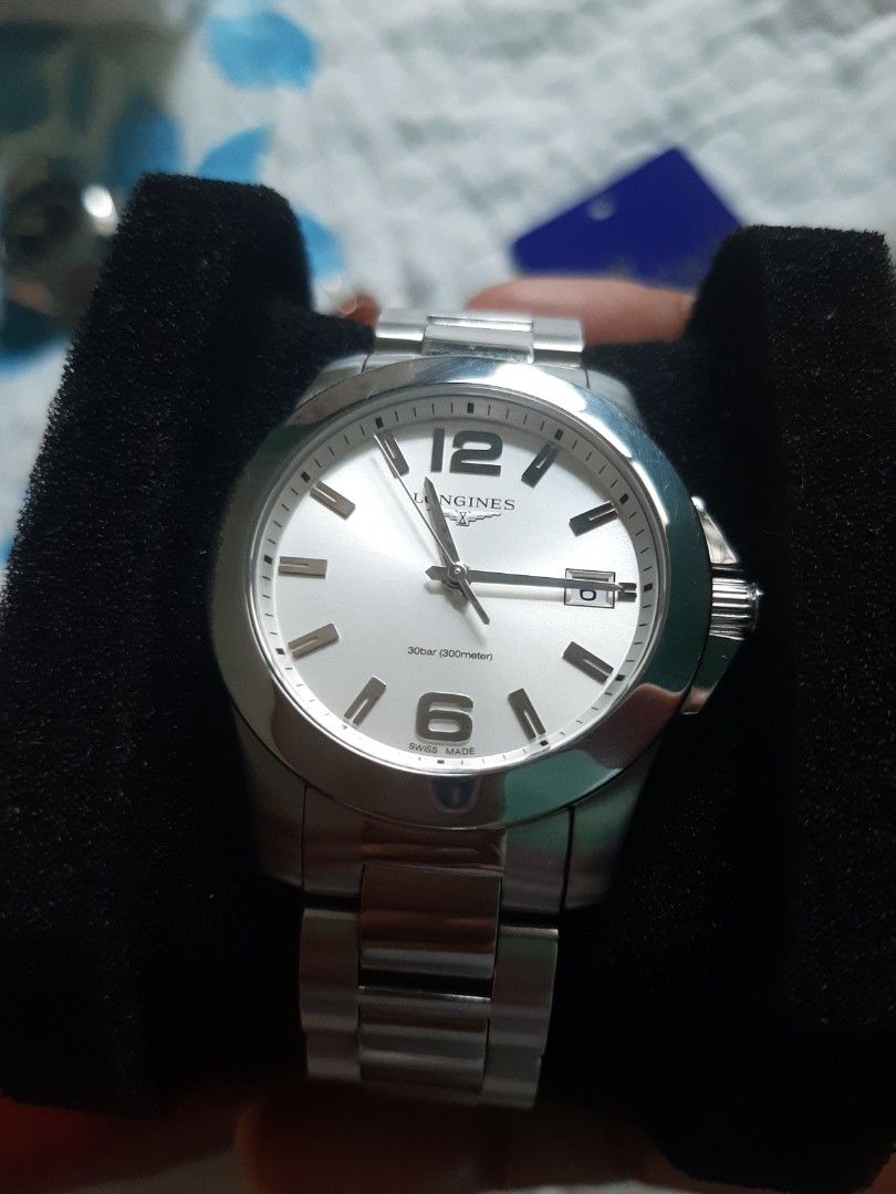 Longines HydroConquest Watch (Category: Luxury Watches) located in Cagayan de Oro. Submitted by purelion.ff7d09 (Listing ID 1396688411, Image 1). Description: - Longines HydroConquest watch - Silver dial - Stainless steel bracelet - Date display at 3 o'clock - Silver bezel - Deployment clasp - Longines logo on dial and clasp - Comes with original box.