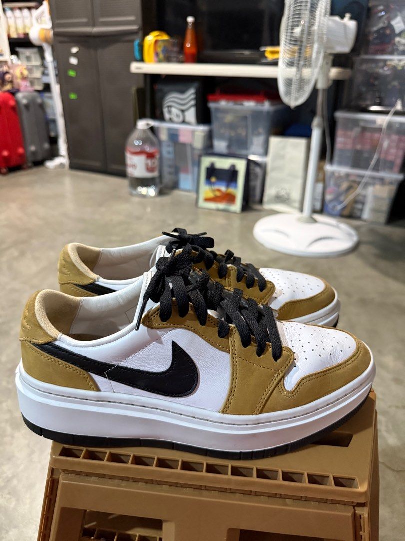 Nike Air Jordan 1 Elevate Low (Category: Sneakers) located in Bulacan. Submitted by rich3lle (Listing ID 1396704040, Image 2). Description: - Air Jordan 1 Elevate Low sneakers - Colorway: White, Black, and Tan - White midsole - Black laces - Nike swoosh visible - Some wear on soles.