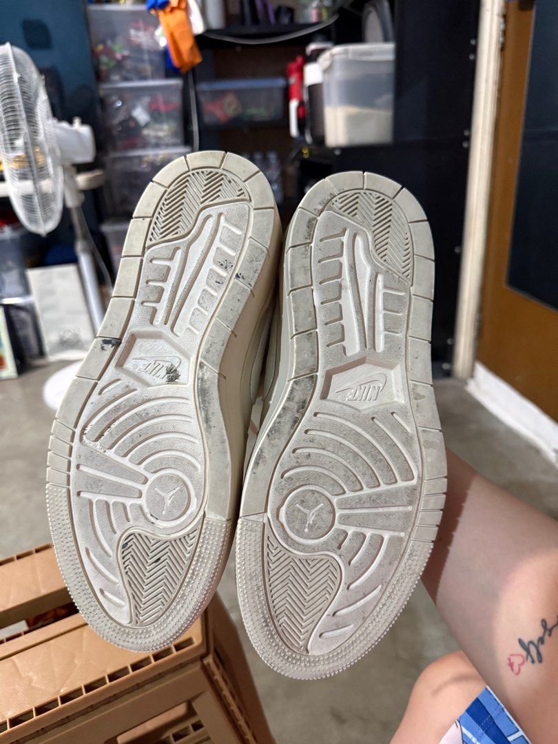 Nike Air Jordan 1 Elevate Low (Category: Sneakers) located in Bulacan. Submitted by rich3lle (Listing ID 1396705109, Image 3). Description: - Cream-colored Nike Air Jordan 1 Low Platform sneakers - Features the iconic Nike swoosh - Platform sole - Signs of wear on soles - Classic Jordan silhouette.