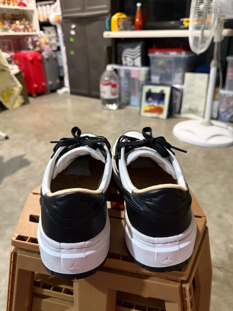 Nike Jordan 1 Elevate Low (Category: Sneakers) located in Bulacan. Submitted by rich3lle (Listing ID 1396704352, Image 2). Description: - Nike Jordan 1 Low - Black and white colorway - White midsole, black outsole - Black laces - Iconic Nike swoosh - Signs of wear on soles.