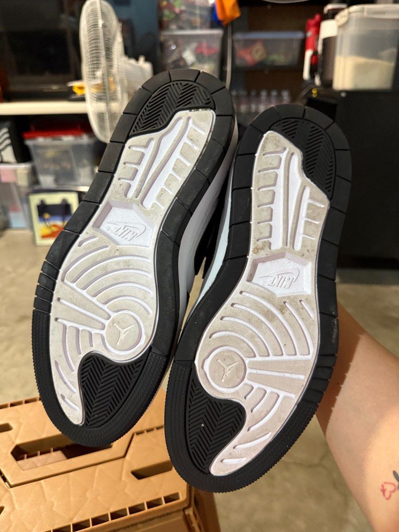 Nike Jordan 1 Elevate Low (Category: Sneakers) located in Bulacan. Submitted by rich3lle (Listing ID 1396704352, Image 3). Description: - Nike Jordan 1 Low - Black and white colorway - White midsole, black outsole - Black laces - Iconic Nike swoosh - Signs of wear on soles.