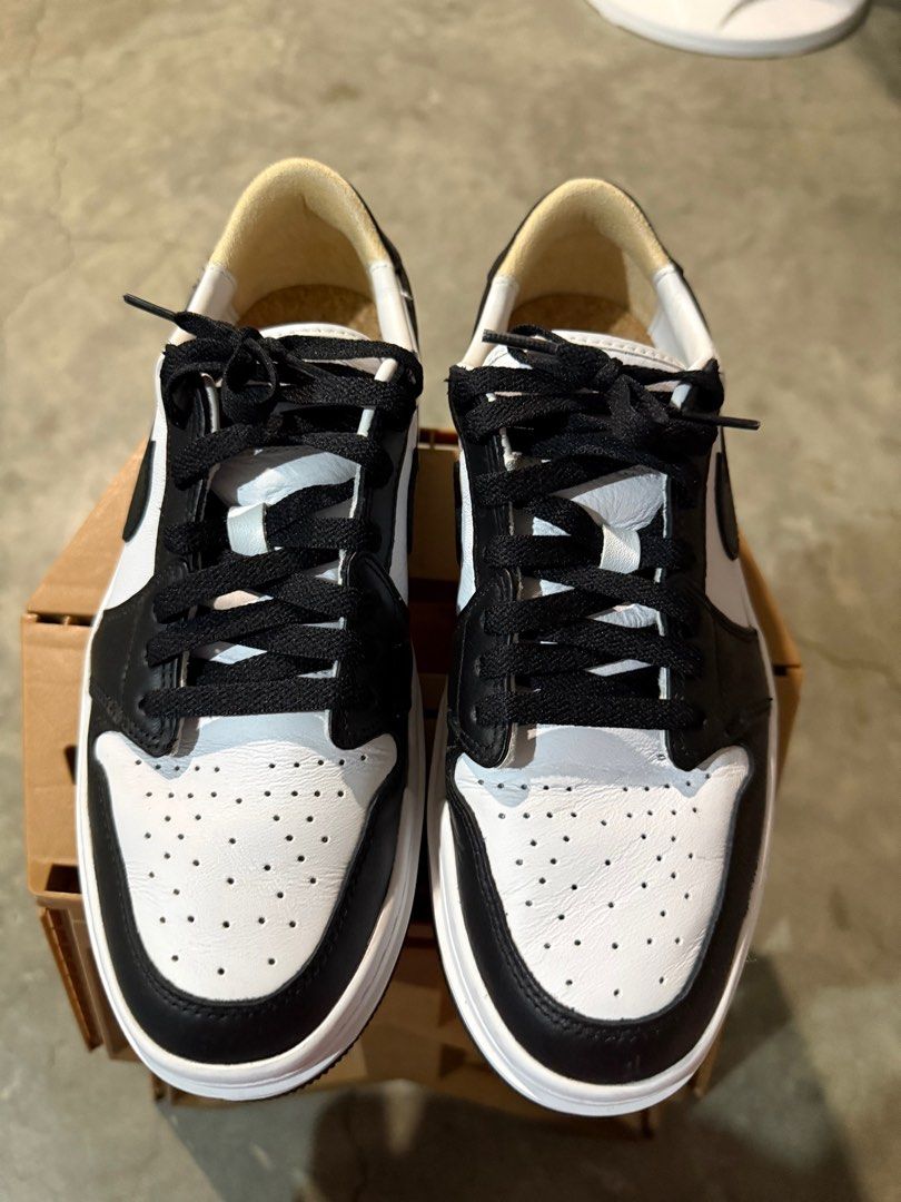 Nike Jordan 1 Elevate Low (Category: Sneakers) located in Bulacan. Submitted by rich3lle (Listing ID 1396704352, Image 1). Description: - Nike Jordan 1 Low - Black and white colorway - White midsole, black outsole - Black laces - Iconic Nike swoosh - Signs of wear on soles.