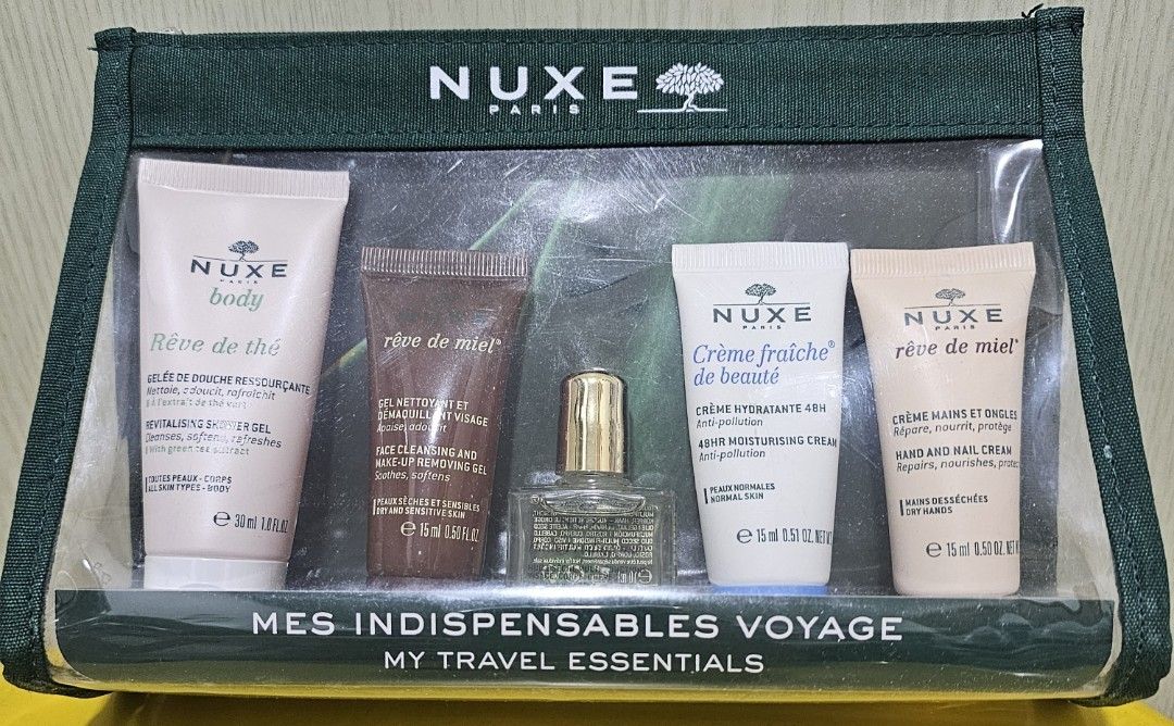 Nuxe Paris My Travel Essentials Set (Category: Body Care) located in Makati City. Submitted by estongcold (Listing ID 1396694570, Image 3). Description: - Nuxe Paris Travel Essentials Set - Includes: - Revitalizing Shower Gel - Face Cleansing and Make-up Removing Gel - Perfume - 48hr Moisturizing Cream - Hand and Nail Cream - Comes in a clear travel pouch. - Perfect for travel or to sample Nuxe products..