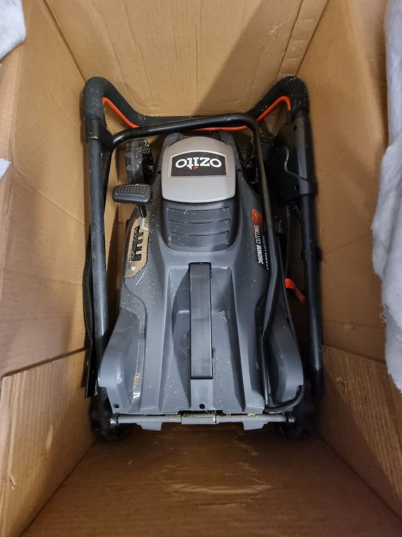 Ozito Electric Mower 1500W 360mm (Category: Construction Tools & Equipment) located in San Juan City. Submitted by salesite (Listing ID 1396787905, Image 2). Description: - Ozito Electric Mower - 360mm Cutting Width - Powerful 1500W Motor - 36L Catcher - Includes Original Box - Foldable Handle for Compact Storage - Box displays features and specifications.