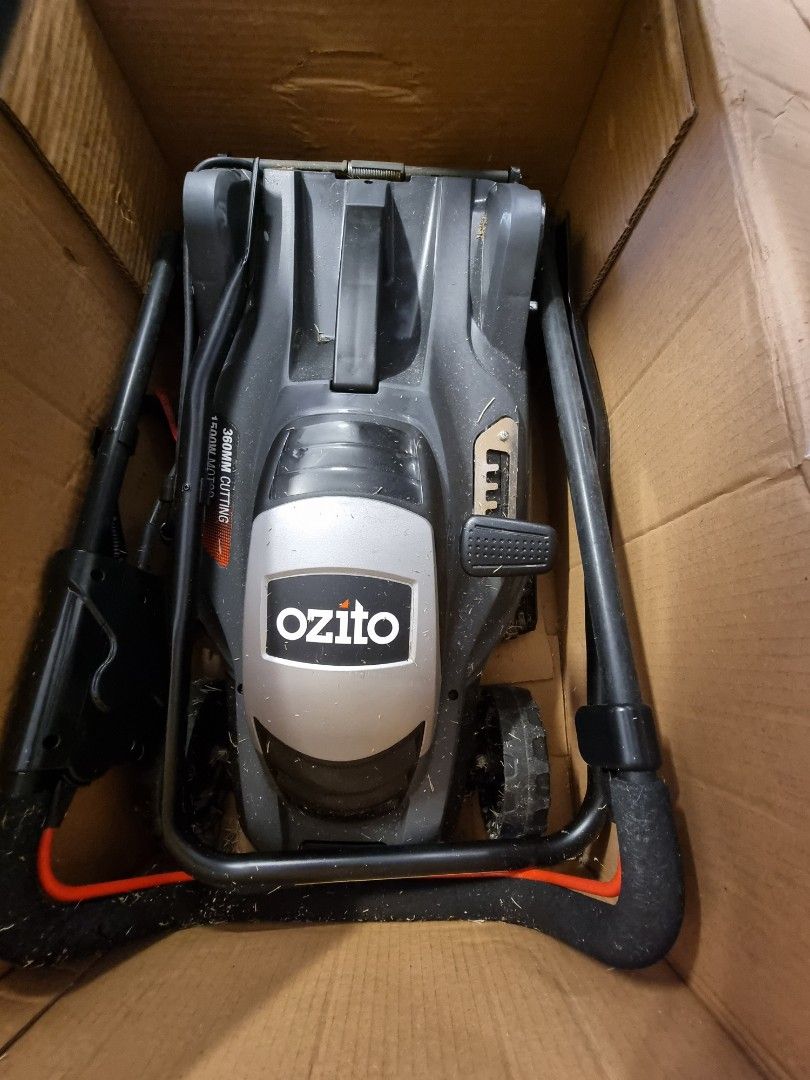 Ozito Electric Mower 1500W 360mm (Category: Construction Tools & Equipment) located in San Juan City. Submitted by salesite (Listing ID 1396787905, Image 3). Description: - Ozito Electric Mower - 360mm Cutting Width - Powerful 1500W Motor - 36L Catcher - Includes Original Box - Foldable Handle for Compact Storage - Box displays features and specifications.