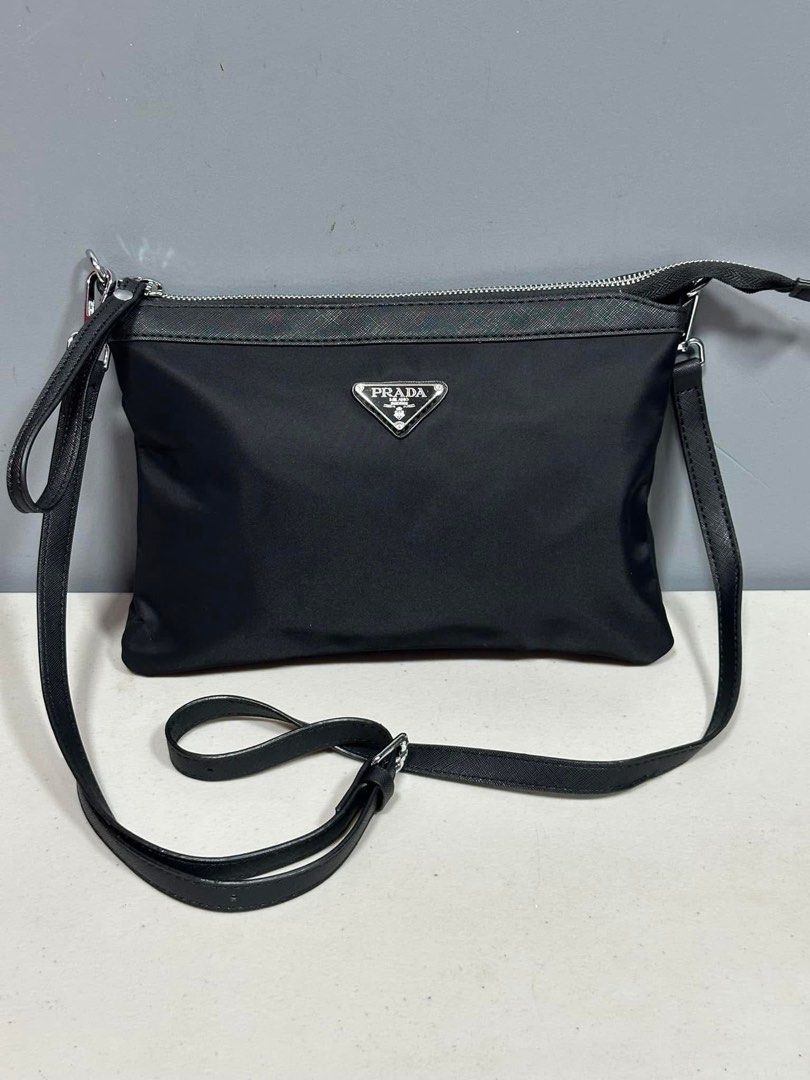 Preloved sling bag (Category: Luxury Bags & Wallets) located in Los Banos. Submitted by ditasbautista2329 (Listing ID 1396697026, Image 1). Description: Preloved sling bag pradeyyy Small-med but bulky inside Good as new Nylon material.