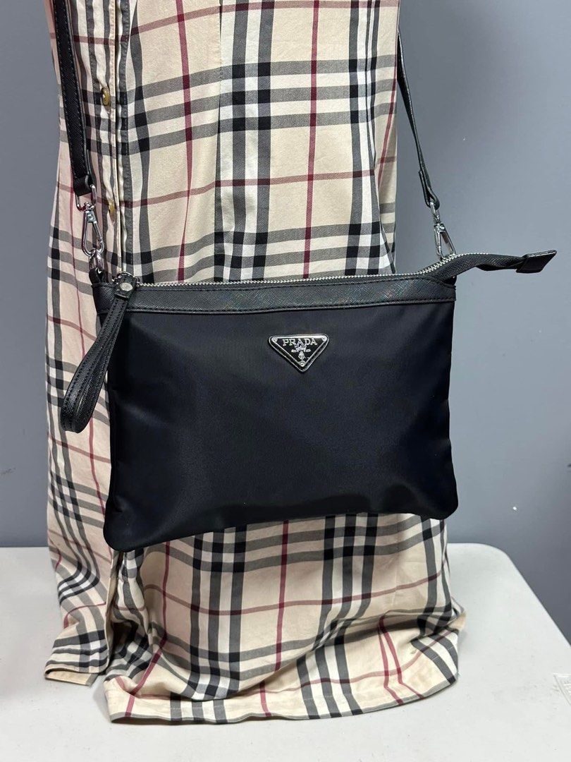Preloved sling bag (Category: Luxury Bags & Wallets) located in Los Banos. Submitted by ditasbautista2329 (Listing ID 1396697026, Image 2). Description: Preloved sling bag pradeyyy Small-med but bulky inside Good as new Nylon material.