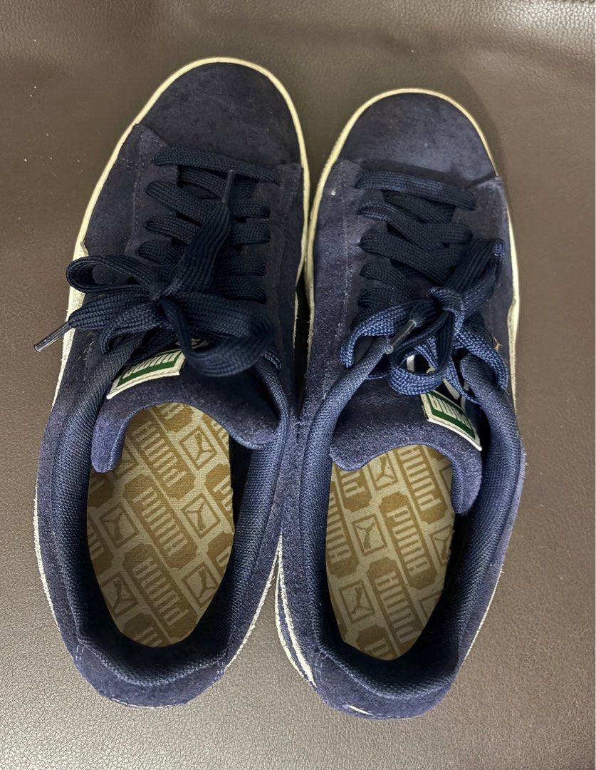 Puma Suede Classics (Category: Sneakers) located in Quezon City. Submitted by capfer (Listing ID 1396725971, Image 2). Description: RUSH SELLING! - Puma Suede Classics -Guaranteed original - Color: Navy blue and white - Puma detail and logo -Very good condition; lady owned -No box -Shipping fee care of buyer -Open to negotiation for sure buyers; let me know your budget 😊.