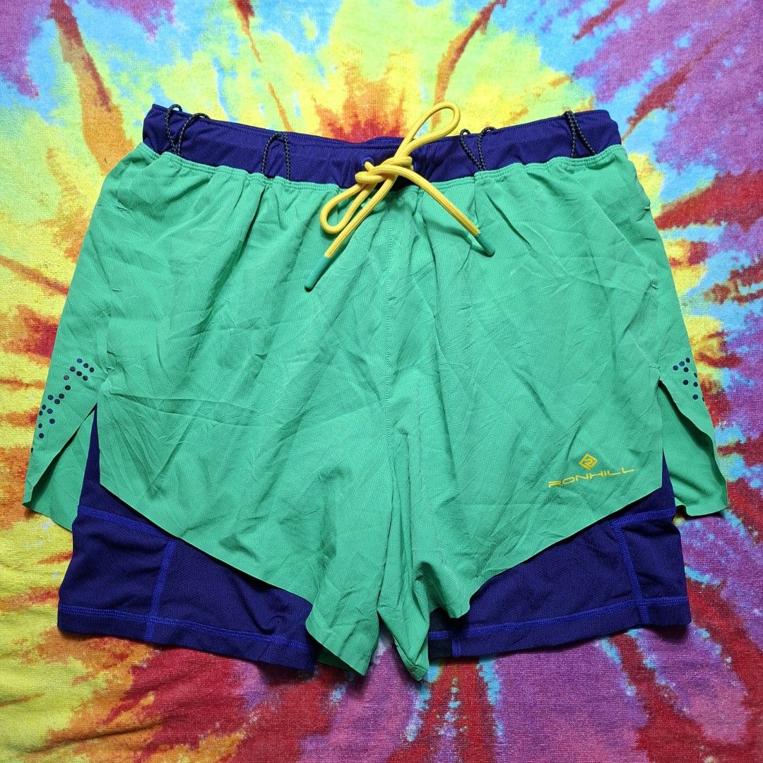 Ronhill - m (men's) (Category: Activewear) located in Puerto Princesa. Submitted by thrinidad (Listing ID 1396806994, Image 2). Description: tech distance twin shorts size medium dimension (laid flat) waist 14" liner length 16" fits 28" waistline and above no damage/stain (3) 1 back pocket, 2 liner pockets Disclaimer : I do not own nor claim to own the rights to any of the brand, logo and photo. Color may vary due to photographic lighting sources