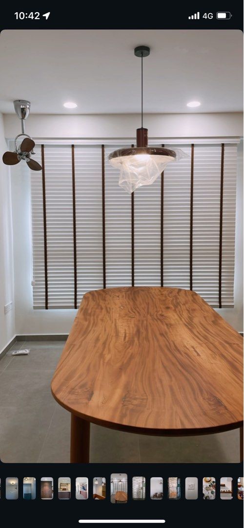 Solid Wood Dining Table (Category: Tables & Sets) located in Singapore. Submitted by oldisthenewgold (Listing ID 1396701314, Image 1). Description: - customised Solid wood dining table 2.1m length, 0.96m width - Unique natural wood grain mahogany wood - Ideal for family meals and entertaining - A stunning centerpiece.