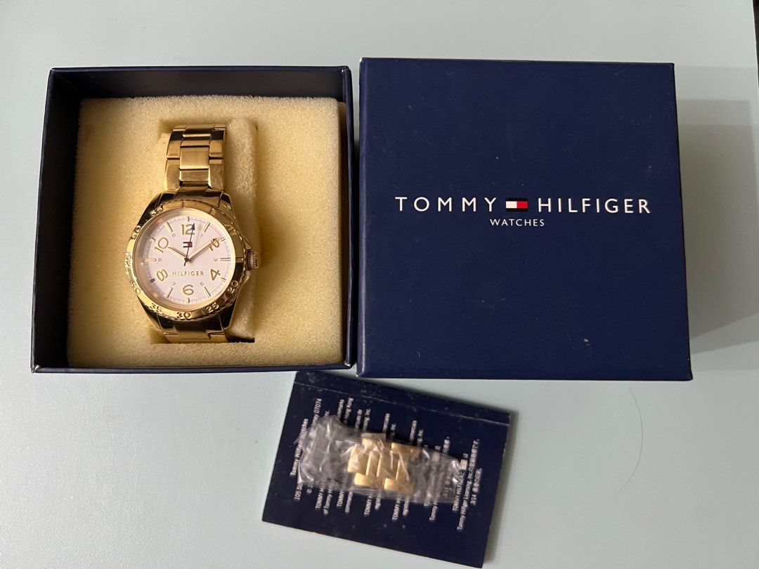Tommy Hilfiger Gold Watch (Category: Women's Watches) located in Makati City. Submitted by the.archives (Listing ID 1396668250, Image 1). Description: Gold-toned Tommy Hilfiger watch. Includes the original box, extra links and manual. .