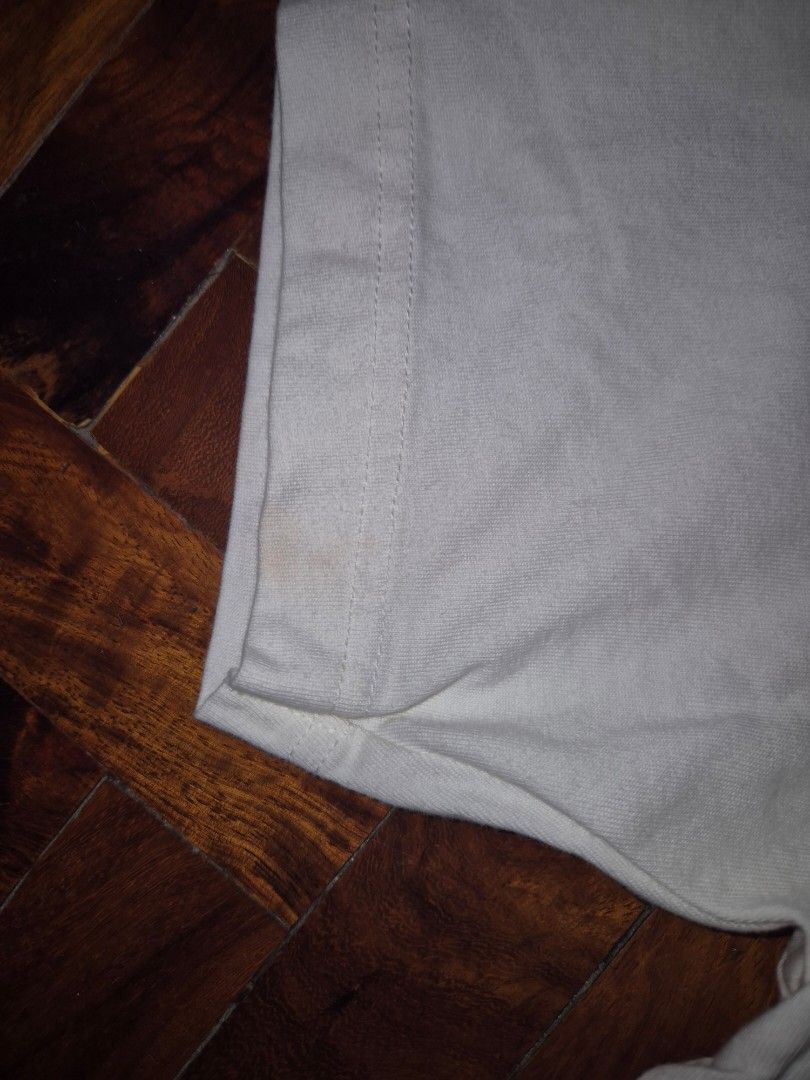 Uniqlo Detective Conan Graphic Tee (Category: Tshirts & Polo Shirts ) located in Quezon City. Submitted by offthesehands (Listing ID 1396767127, Image 3). Description: Brand: Uniqlo UT T-Shirt Color: cream white Type: detective conan series Size: S Price: P200 only bec of the stain Usage: faded stain on the end of one arm of the tee RFS: decluttering DM if interested | Will only entertain questions related to the item.