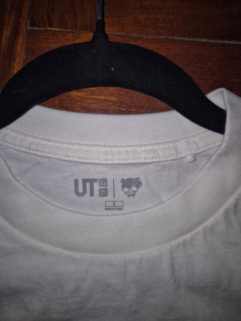 Uniqlo Detective Conan Graphic Tee (Category: Tshirts & Polo Shirts ) located in Quezon City. Submitted by offthesehands (Listing ID 1396767127, Image 2). Description: Brand: Uniqlo UT T-Shirt Color: cream white Type: detective conan series Size: S Price: P200 only bec of the stain Usage: faded stain on the end of one arm of the tee RFS: decluttering DM if interested | Will only entertain questions related to the item.