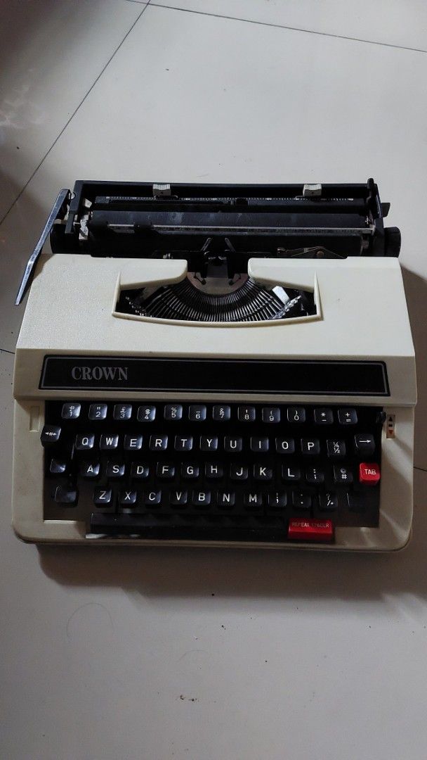 Vintage Crown Typewriter (1980s) (Category: Office & Business Technology) located in Legazpi City. Submitted by burgerdoritos (Listing ID 1396708943, Image 1). Description: with case.