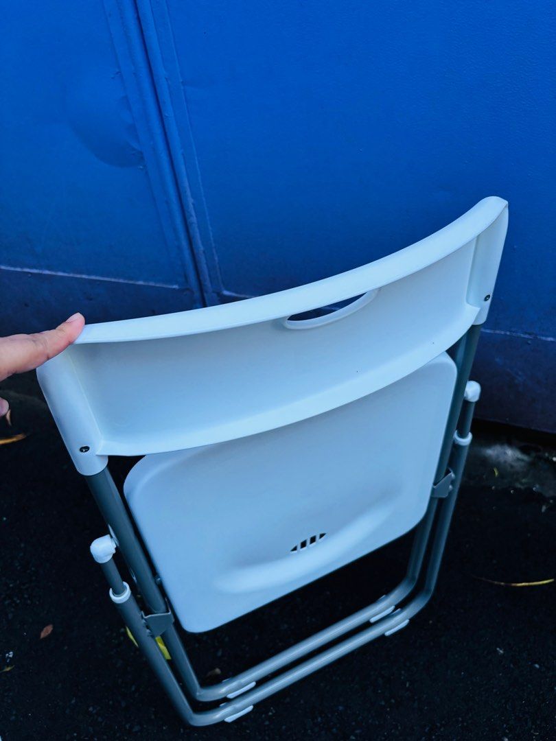 White Folding Chair (Category: Chairs) located in Pasig City. Submitted by gammad_05 (Listing ID 1396839114, Image 3). Description: - White folding chair - Made with durable carbon steel tube material - Smooth edges and corners for safety - Convenient handle for easy carrying - Non-slip foot pads for stability - Easy to grab and move - Dimensions: 76cm (Height) x 40cm (Width) x 44cm (Depth) - Seat Size: 38cm x 38cm.