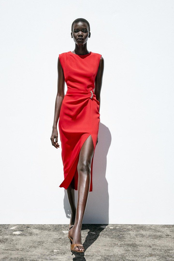 Zara Red midi dress with hardware (Category: Dresses) located in Malabon City. Submitted by decluttergyal (Listing ID 1396766451, Image 3). Description: Size is XS. The color is not for me. Looks so much better in person! Can be worn at the office or for dinner dates. Tags are just cut but never worn only fitted 🥲 No more haggling please! Tags: Zara, Mango, H&M, Stradivarius, Massimo Dutti.