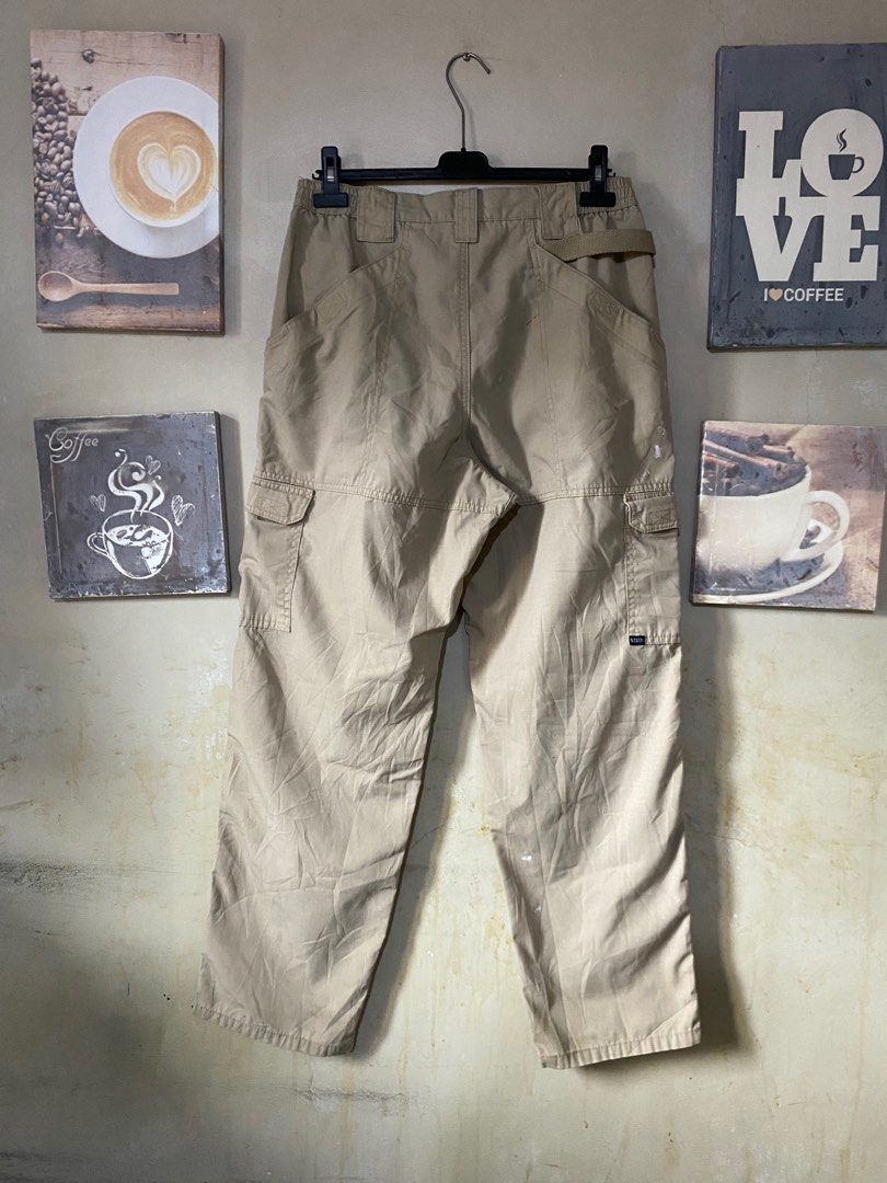 5.11 Tactical Cargo Pants (Category: Jeans) located in Manila. Submitted by thrifttothecity (Listing ID 1396862762, Image 2). Description: - 5.11 Tactical cargo pants - Tan color - Multiple pockets for storage - Button closure - Reinforced design - Relaxed fit - Ideal for outdoor activities and everyday use Size 32-36 x 42 Hem 8 Issue removable stain and dot stain.