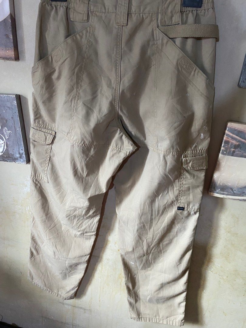 5.11 Tactical Cargo Pants (Category: Jeans) located in Manila. Submitted by thrifttothecity (Listing ID 1396862762, Image 3). Description: - 5.11 Tactical cargo pants - Tan color - Multiple pockets for storage - Button closure - Reinforced design - Relaxed fit - Ideal for outdoor activities and everyday use Size 32-36 x 42 Hem 8 Issue removable stain and dot stain.