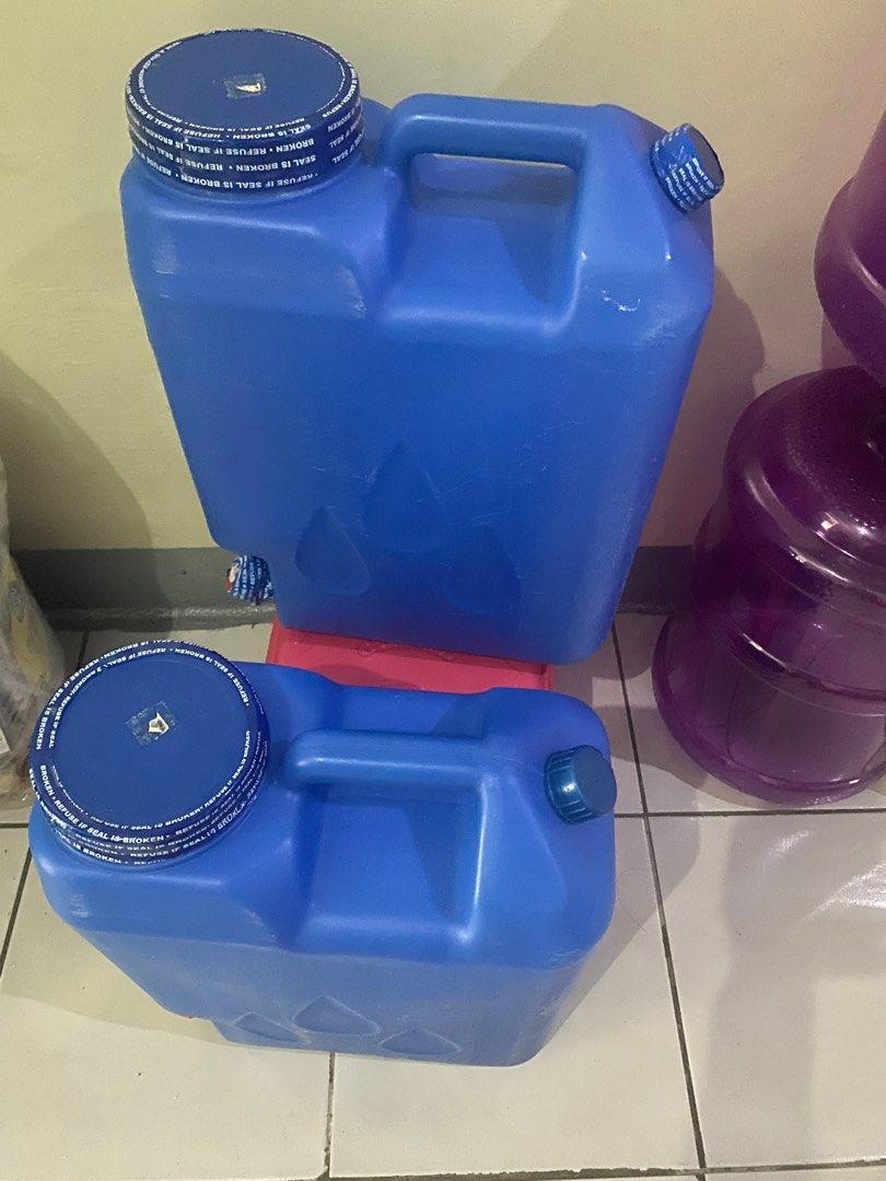 Blue Water Container with Spigot (Category: Food Organization & Storage) located in Mandaluyong City. Submitted by diamondzee (Listing ID 1396859207, Image 2). Description: - Durable blue water container - Convenient handle and spigot - Secure lid for clean water - Water drop design - Ideal for home and outdoor activities -5 Gallon each (2pcs).