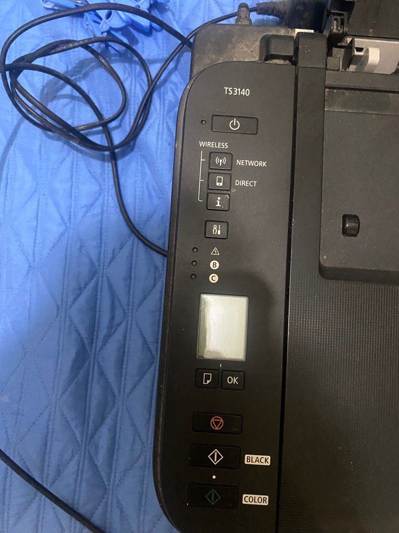 Canon PIXMA TS3140 Printer (Category: Printers, Scanners & Copiers) located in Manila. Submitted by eli024 (Listing ID 1396896080, Image 2). Description: - Canon PIXMA TS3140 printer - Wireless, network, and direct printing - Built-in scanner - Color and black printing options - Power and OK buttons - Top cover opens.